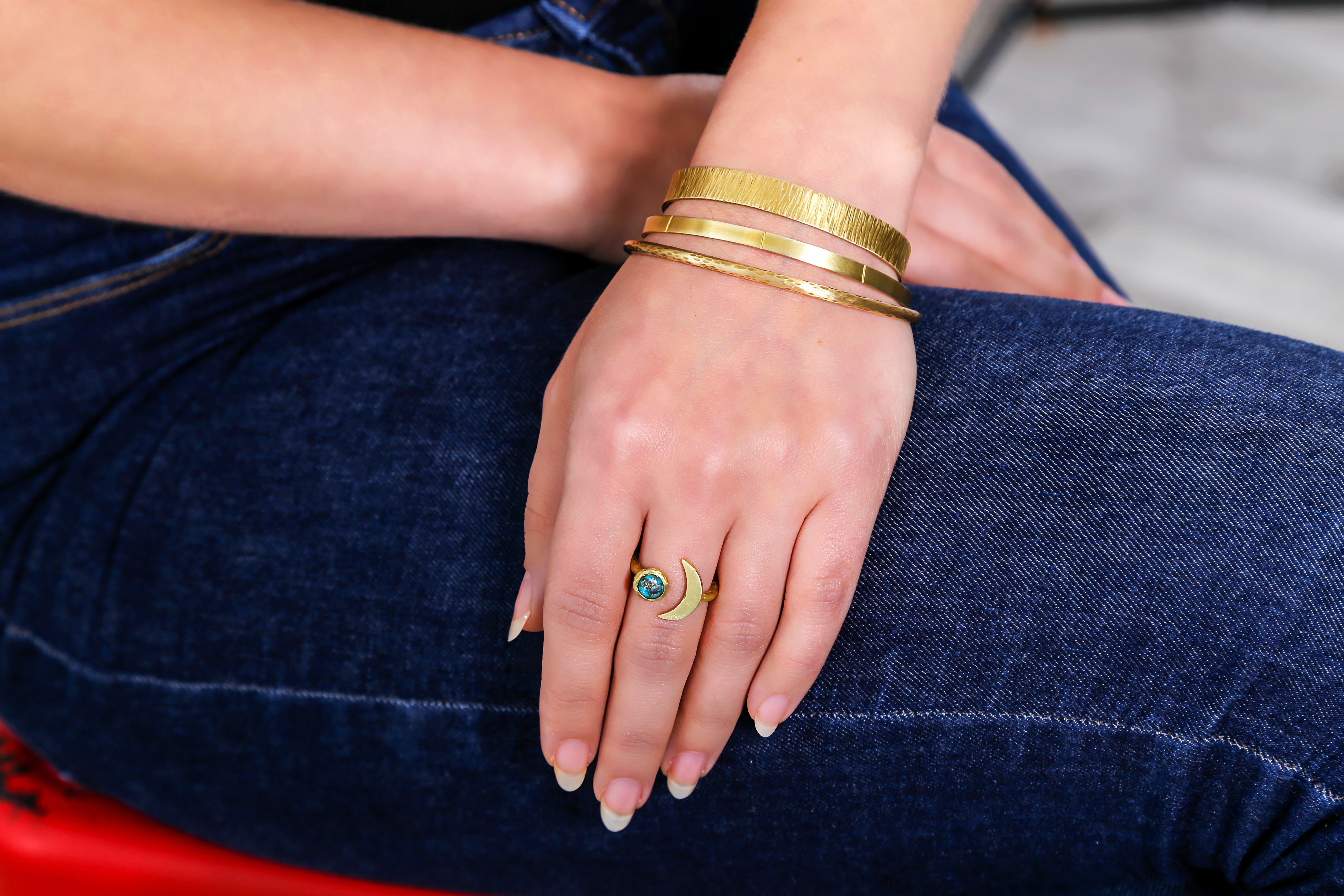 fashion model with moon shaped ring and bangles 
